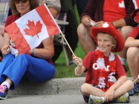Jonah Earle, is shown in this file photo watching the 2013 Canada Day parade in Sarnia. This  year's festivities are going virtual amid COVID-19.