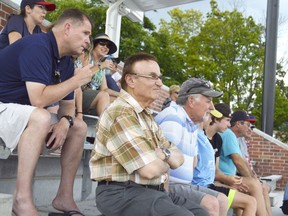Sarnia councillors Bill Dennis, left, Dave Boushy, and Mike Stark are pictured watching a Sarnia Braves baseball game in July 2019. City council was divided Monday about how to resolve a problem with the minutes from the June 1 council meeting, in which an apparent glitch seemed to cause Dave Boushy's vote to be miscounted.