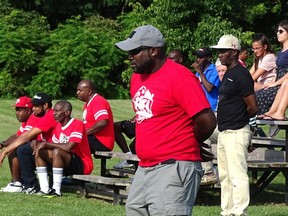 The annual  Farms of Norfolk Football Association tournament has been cancelled for this year due to the pandemic. At the 2019 tournament, honorary coach Damion Prince (right) made sure his Schuyler Farms team stayed positive during a game. FILE PHOTO