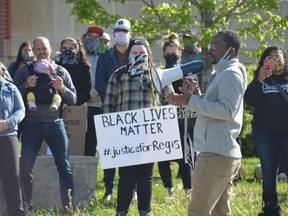 Roby Joseph, originally from Haiti, addresses a gathering outside the Sudbury Courthouse on Sunday to protest racial injustice. Joseph has called Sudbury home for six years.