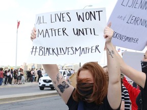 Hundreds of people lined both sides of the Bridge of Nations during a protest against racism and police brutality in Sudbury on Wednesday.