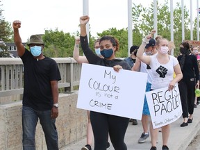 Hundreds of people lined both sides of the Bridge of Nations during a protest against racism and police brutality in Sudbury, Ont. on Wednesday June 3, 2020. More rallies are planned, including one Friday on Manitoulin Island.