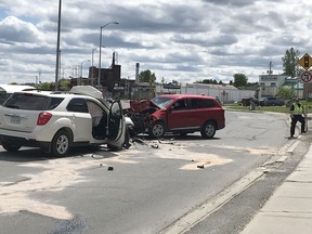 Greater Sudbury Police Service investigate a two-vehicle collision on Lorne Street, near Your Independent Grocer, on Saturday.