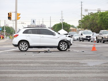 Greater Sudbury Police, the fire department and EMS workers attended the scene of a multi-vehicle collision at the intersection of Lasalle Boulevard and Notre Dame Avenue in Sudbury, Ont. on Wednesday June 10, 2020. John Lappa/Sudbury Star/Postmedia Network