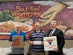 From the left are Gary Newbury, executive director of the Elgin St. Mission, Braden McKinnon, chair, Christmas Dinner, and Gerry Lougheed, chair, Food Fund. Supplied photo