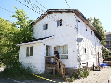 The Ontario Fire Marshal's Office and Greater Sudbury Police are investigating a dwelling fire on Elizabeth Street in Sudbury, Ont. on Thursday June 18, 2020. Greater Sudbury Fire Services received a call about the blaze at 4:25 a.m. Thursday. The building sustained heavy fire damage at the back of the building. John Lappa/Sudbury Star/Postmedia Network