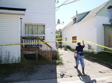 The Ontario Fire Marshal's Office and Greater Sudbury Police are investigating a dwelling fire on Elizabeth Street in Sudbury, Ont. on Thursday June 18, 2020. Greater Sudbury Fire Services received a call about the blaze at 4:25 a.m. Thursday. The building sustained heavy fire damage at the back of the building. John Lappa/Sudbury Star/Postmedia Network