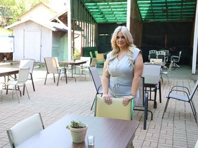 Melanie Pharand shows off the patio area that recently opened up at the Italian Club in Copper Cliff, Ont. on Friday June 19, 2020. The patio will be open from 2 p.m. to 11 p.m., Wednesday to Sunday. Takeout is also available on the same days, while lunch is being offered on Thursday and Friday, starting at 11:30 a.m.