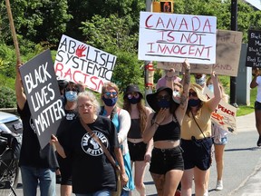 Hundreds of people march in the Black Lives Matter: Juneteenth Racial Injustice Rally in Sudbury, Ont. on Friday June 19, 2020.