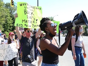 Participants march in the Black Lives Matter: Juneteenth Racial Injustice Rally in Sudbury, Ont. on Friday June 19, 2020.