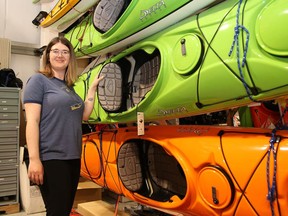 Brandice Ramakko-Burke, of Ramakko's Source for Adventure, shows a selection of kayaks at the store.