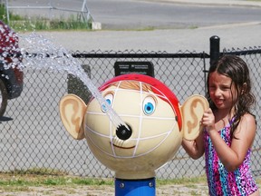 Marianna, 7, cools off at the splash pad at the DJ Hancock Memorial Park in Sudbury, Ont. on Monday June 22, 2020.