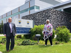 Health Sciences North CEO Dominic Giroux, left, stands with Sarita Verma, dean of the Northern Ontario School of Medicine. HSN and NOSM have signed a five-year affiliation agreement.