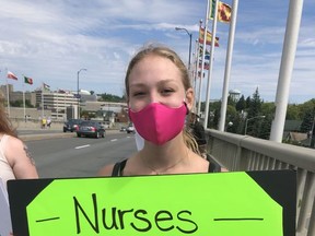 Kayla Katerynuk, a Laurentian University nursing student, participates in a nurses' protest against Bill 124 earlier this year on the Bridge of Nations.