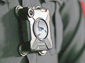 A Calgary police staff sergeant wears one of the service's body cameras. Greater Sudbury's police chief has some concerns about the use of body-worn cameras on police officers. Gavin Young/Postmedia