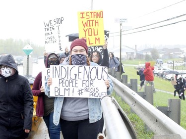 Participants in the anti-racism demonstration in Timmins Wednesday are seen here making their way from the Participark.

RICHA BHOSALE/The Daily Press