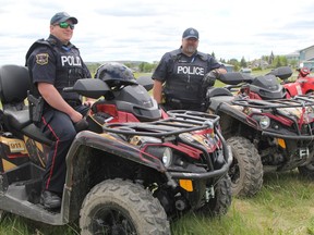 Complaints about all-terrain vehicles being operated on private property and unauthorized has been a problem in Timmins over the years, as evidenced when the Timmins Police Service set up this photo-op as an advisory to the public in June 2019 with constables Darren McGaghran, left, and Troy Larose. 

RON GRECH/THE DAILY PRESS