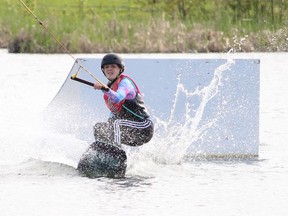 Brooke-lynne McGinn, 12, makes a splash landing coming off the jump at the Timmins Wake Park on Tuesday evening. The wake park has benefited from residents who have been holed in up virtual quarantine for the last few months and who are eager to play outdoors.

RICHA BHOSALE/The Daily Press