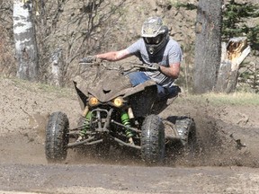 File photo of an all-terrain vehicle riding through muddy trails.

Brendan Miller/Postmedia