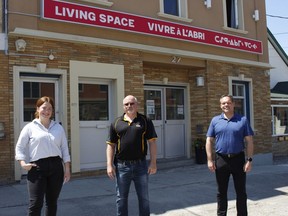 Stephanie Labelle, community relations superintendent with Kirkland Lake Gold, from left, Milferd Burnett, director of supply change management at KL Gold, and Brian Marks, chief administrative officer at Cochrane District Social Services Administration Board, were outside the Living Space's building on Friday afternoon as the mining company made a donation of $556,306 in support of social services within Cochrane District. The funds will be used for two programs supporting homeless shelters in Timmins and at Northern College's student residence.

RICHA BHOSALE/The Daily Press