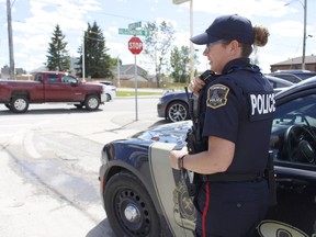 Timmins Police Service Const. Melanie Beaulac, was monitoring the traffic on Thursday afternoon at the intersection of Charles Street and Algonquin Boulevard West as TPS have been receiving a number of complaints from cyclists about vehicles not keeping a safe distance.

RICHA BHOSALE/The Daily Press