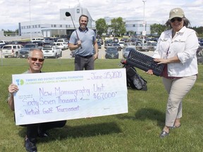 Guy Guindon, manager of medical imaging at Timmins and District Hospital, from left, Jason Laneville, executive director at TADH Foundation in middle and Barb McCormick, manager of donor relations with the TADHF, gathered Thursday afternoon gathered in front of the hospital to celebrate the successful wrap-up of the 11th-annual fundraising John P. Larche Charity Golf Tournament. The event raised $67,000 which will go towards the purchase of a new mammography unit at the hospital this year. 

RICHA BHOSALE/The Daily Press