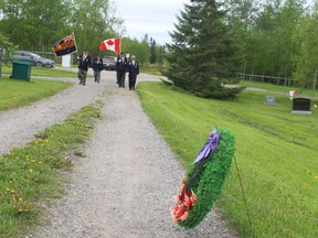 The Colour Party, consisting of Fred Smith, Jim Smith, Bonnie Axcell, and Marg Claveau, commemorated D-Day and its importance in the course of history. TP.JPG