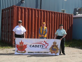 LCdr Sabrina Vachon Commanding Officer, Findlay Barr of the Cochrane Lions Club and Captain Patricia Nelson Training Officer stand in front of the sea-can which was donated to the cadets from the Lions Club..TP.JPG