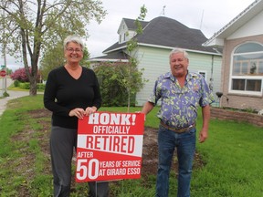 Liette and Ralph Girard celebrate his retirement after 50 years at Girard Esso. The couple have been together for 45 of those years. .TP.JPG