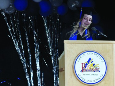 Alyssa Groves delivers her valedictorian address during County Central High School's graduation ceremony Saturday.