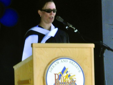 County Central High School principal Leanne Hellmann speaks Saturday during the school's 2020 graduation ceremony, which was held in the parkng lot of the Cultural-Recreational Centre due to COVID-19 gathering restrictions.
