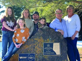 The Roe family. From left are Neve, Elle, Sarah, Josh and Ayla Umscheid, and Gordon and Joyce Roe. Sarah Umscheid is one of Gordon and Joyce Roe's daughters, and she and husband Josh built a home on the farm in 2014.