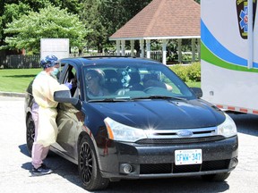 Over 150 people were tested for COVID-19 on June 11, the first day of a three-day mobile, drive-thru testing clinic held at the Wallaceburg site of the Chatham-Kent Health Alliance. (Jake Romphf/Postmedia Network)