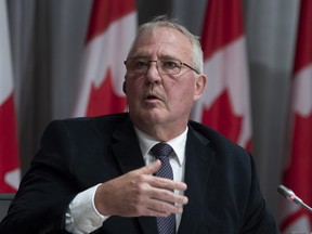 Public Safety and Emergency Preparedness Minister Bill Blair responds to a question during a news conference Tuesday June 9, 2020 in Ottawa. THE CANADIAN PRESS/Adrian Wyld