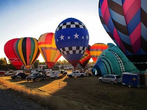 Pilots prepare their balloons for the day's activities.