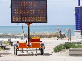 Lambton Shores bylaw enforcement officers have at times been deployed in Grand Bend to keep people off the beach. Photo shot on Wednesday May 27, 2020. Derek Ruttan/The London Free Press