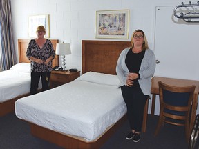 Photo by KEVIN McSHEFFREY/THE STANDARD
House of Kin operations manager Barb Henderson, and fundraising and marketing coordinator Karly Bortolotti show one of the newly renovated rooms.
