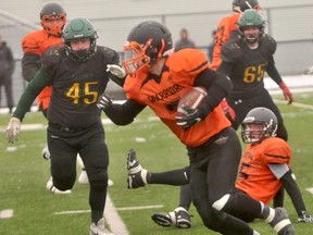 Tristen Peddle (shown here in 2018 Peace Bowl action against the St. Joe's Celtics) recently signed up to play in the Canadian Junior Football League for the Kelowna based Okanagan Sun. The former running back for the Grande Prairie Composite Warriors signed on June 1, CFJL National Signing Day