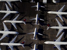 Delta Air Lines passenger planes are parked at Birmingham-Shuttlesworth International Airport in Birmingham, Ala.