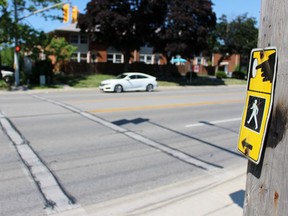 A car approaches the crosswalk on Exmouth Street at Trillium Park on Tuesday June 30, 2020 in Sarnia, Ont. (Terry Bridge/Sarnia Observer)