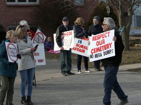 Locals protest the proposed landfill outside Walker Environmental's building in Ingersoll, Ont. on Wednesday March 27, 2019. The community liaison committee met for the 35th time Wednesday with about 100 people protesting outside Walker Environmental's building. Greg Colgan/Woodstock Sentinel-Review/Postmedia Network