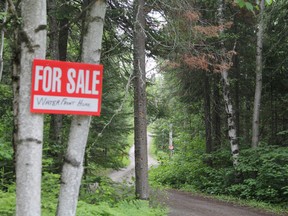 Realtors have been finding ways to work within restrictions to still show properties amid the current pandemic. While transactions are down, that hasn't stopped property owners from putting their residences on the market, such as this owner on Finn Road. RON GRECH/The Daily Press