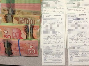 Cash seized by Ontaroi Provincial Police during a traffic stop south of Wawa. (SUPPLIED PHOTO)
