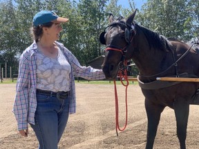 Donita Wiebe-Neufeld, who keeps her horse, CD, in Colchester, is riding 100-kilometres as part of the Mennonite Central Committee's Go! 100 centennial anniversary fundraising event. Lindsay Morey/News Staff