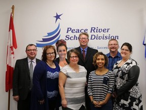 The Peace River School Division's Board of Trustees. Back Row: (left to right) Paul Bennett, Delainah Velichka, Richard Walisser, Darren Kuester. Front Row: (left to right) Rhonda Freeman, Lori Leitch, Robyn Robertson, Crystal Owens. Missing from photo: Marie Dyck, Ward One.