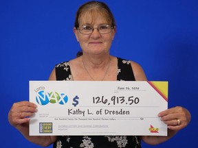 Kathy Luck of Dresden, shown at the OLG Prize Centre in Toronto, won $126,913.50 playing Lotto Max. She purchased her ticket at Sonny's Variety of Lindsley Street in Dresden. (Handout/Postmedia Network)