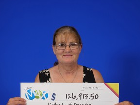 Kathy Luck of Dresden, shown at the OLG Prize Centre in Toronto, won $126,913.50 playing Lotto Max. She purchased her ticket at Sonny's Variety of Lindsley Street in Dresden. (Handout/Postmedia Network)