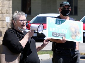 Chatham-Kent Health Coalition chairperson Shirley Roebuck speaks during a protest about issues in long-term care homes outside MPP Rick Nicholls's office in Chatham in June. Mark Malone/Postmedia Network