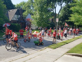 Residents of Norman, Cecil and Watson streets were invited to take part in a safe, socially distant Canada Day parade on July 1, thanks to one resourceful neighbourhood mom who organized the truncated event. Photo submitted by Margo Harrison for Sarnia This Week