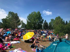 A viral photo from Saturday, July 11 shows a crowded beach at Sylvan Lake. The Twitter user @papercandie, an Edmonton mother who posted the photo said; "My anxiety was a tad high today. Don't think we'll be going back. I felt like a Covidiot today." Photo courtesy Twitter/@papercandie